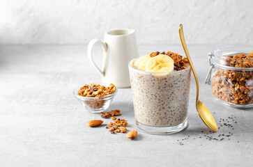 chia pudding with banana, granola and cinnamon, overnight banana oats, healthy breakfast or snack, v