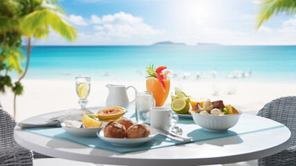 beautiful breakfast on a beach with fruit and a croissant