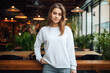 © Jasmina - Beautiful woman wearing white sweater and jeans, at cafe. Design sweater template, print presentation mockup