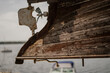 Wooden sail boat with old wood texture close up in brown color