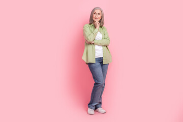 Sticker - Photo of minded gorgeous retired lady professional expert wear stylish clothes look up empty space offer isolated on pink color background