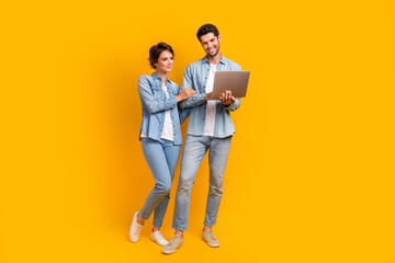 Aufkleber - Photo of businessman businesswoman using netbook eshop web isolated bright color background