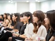 © Generative AI - A horizontal side view shot of Japanese women joining the seminar for women : Generative AI
