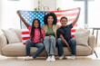 © Maria Vitkovska - Portrait of African American woman and children, holding American flag, national symbol of America