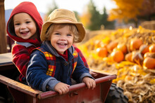 Two Kids Riding In Wagon Through Pumpkin Patch, Fall Autumn Season, Fun Activity, Thanksgiving, Halloween, Copyspace