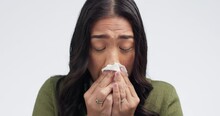 Sneeze, Sick Woman And Allergies With Nose Blowing In Tissue And Toilet Paper From Virus. Studio, White Background And Female Person With Disease And Cough From Health And Wellness Issue With Cold