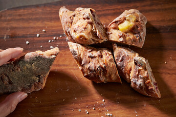 Sticker - Sliced fermented bread on a bare cutting board