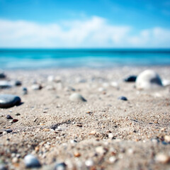 Wall Mural - Empty sandy beach with pebbles and blurred tropical beach background. Focus on the foreground. Shallow depth of field. High quality photo