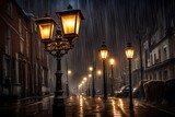 Fototapeta Uliczki - An antique street lamp aglow in the rain.