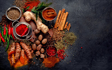 Poster - Spices on dark background. Different varius.