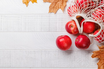 Wall Mural - Mesh bag with fresh red apples