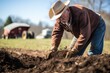 © Ева Поликарпова - Farmer digging in ground