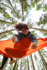 Poster - happy woman on hammock in the forest