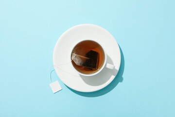 Wall Mural - Concept of hot drink - tea and tea bag