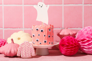 Wall Mural - Festive pink cake with a ghost for Halloween