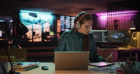 Aufkleber - Beautiful Female Specialist is Writing Business Strategy, Using Digital Tablet to Take Notes in Creative Office Environment. Young Project Manager with Headphones Working on Laptop Computer