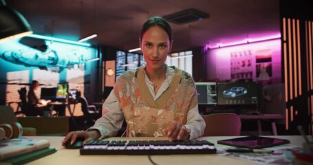 Aufkleber - Zoom Out Portrait of a Young Woman Typing on Keyboard and Working on Desktop Computer in a Creative Office with Neon Lights. Female Software Developer Writing Code. Point of View of Screen Monitor