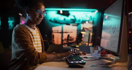 Aufkleber - Zoom in: Motivated Black Female Using Desktop Computer in Creative Agency in the Evening. Happy Dedicated Woman Working in a Creative Job Position in an Advertising Company While Smiling