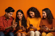 youngster group using smartphone and laughing