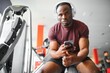 © Serhii - Young athletic African American man in the gym