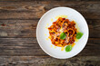 © Jacek Chabraszewski - Tagliatelle con ragù alla bolognese - pasta with minced meat and tomato sauce on wooden table