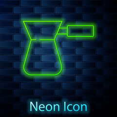 Poster - Glowing neon line Coffee turk icon isolated on brick wall background. Vector