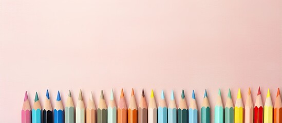Aufkleber - Color pencils are positioned in front of a isolated pastel background Copy space