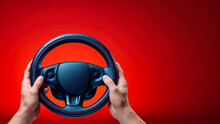 Hand Holding Black Car Steering Wheel On Red Background, Minimalist Concept.