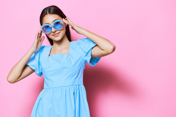Wall Mural - woman beautiful blue pink style dress fashion model studio young pretty