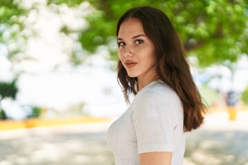 Canvas Print - Young woman smiling confident standing at park