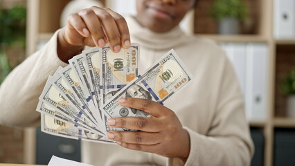 Canvas Print - African american woman business worker counting dollars at office