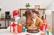 © Krakenimages.com - Mand and woman couple having birthday celebration kissing at home