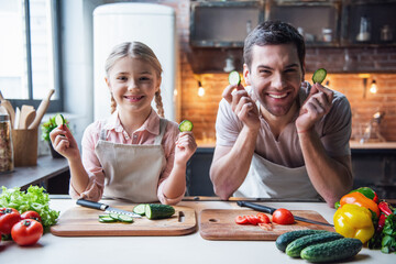 Wall Mural - Father and daughter cooking