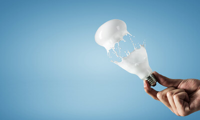 Wall Mural - Light bulb with white glass splash