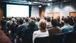 © visoot - Rear view of people in audience at the conference hall, Speaker giving a talk in conference hall at business event.