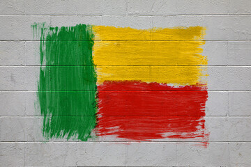 Wall Mural - Benin flag colors painted on brick wall