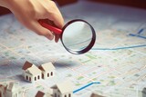 Fototapeta  - Man holding magnifier on cadastre map search for assesses to buy the land lands. real estate concept with vacant land for building construction and housing subdivision for sale, rent, Generative AI