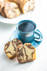 Poster - Marble sponge cake and coffee cup. Cake with cocoa and vanilla taste.