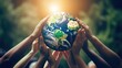 © Fred - Saving the planet concept with multiple hands holding Planet Earth Globe above their head