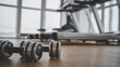 © I - dumbbells in the gym on the floor, the concept of proper nutrition and fitness, a place for the inscription