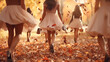 © kichigin19 - cheerful bachelorette party in an autumn park in leaf fall,  girl in a light skirt against the background of autumn falling leaves and friends vacation in autumn