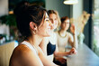 © Flamingo Images - Three friends talking in a health club cafe