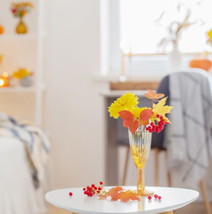 Sticker - beautiful autumnal bouquet with flowers and leaves at home