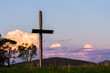 © Austockphoto - Wooden cross shape structure in farm paddock on good Friday for Easter
