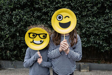 Anonymous Children Holding Handmade Happy Emoji / Emoticon Masks