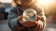© Bw17/Wirestock Creators - AI generated illustration of a child holding a glowing globe