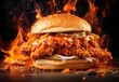 Spicy Fried Chicken Sandwich with hot chili peppers on fire isolated on black background
