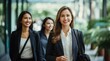 © Usablestores - Polite and Confident Business Women Walking in Office