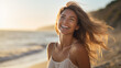 © Studio Nova - Young woman smiles happily while on vacation with the beach in the background