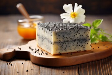 Wall Mural - Piece of poppy seed cake with honey